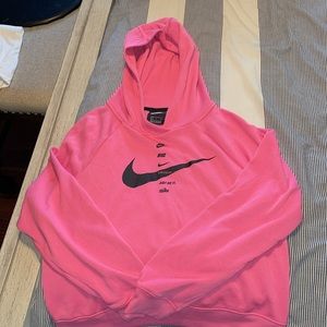 Pink Nike hooded sweatshirt. New without tags. Excellent condition.